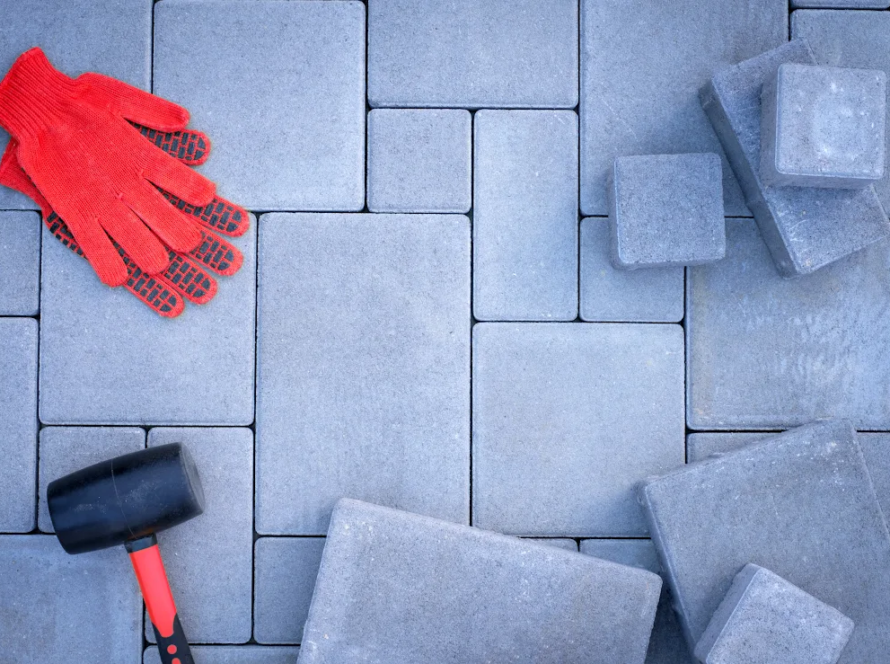 Closeup on a set of freshly installed concrete pavers.